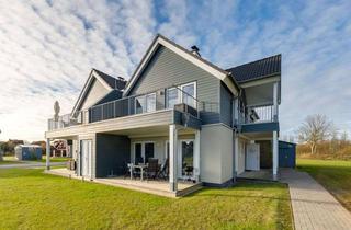 Wohnung kaufen in 25761 Büsum, Küstennah investieren und selbst genießen – hochwertig möblierte Erdgeschosswohnung mit Terrasse