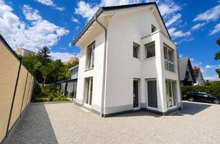 Haus kaufen in 85764 Oberschleißheim, Erstbezug mit Stil: Modernes Reiheneckhaus für höchste Wohnansprüche