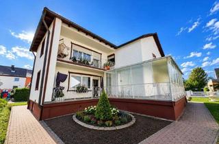 Haus kaufen in 85757 Karlsfeld, Ein Haus mit Potenzial – vielseitig nutzbares Zweifamilienhaus in begehrter Wohnlage