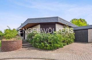 Haus kaufen in 64569 Nauheim, Ein Zuhause mit Charakter: Architekten-Bungalow mit beeindruckendem Raumangebot