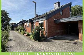 Haus kaufen in 63791 Karlstein, Vielseitige DHH mit Wintergarten, Einliegeroption und markanter Architektur in ruhiger Wohnlage