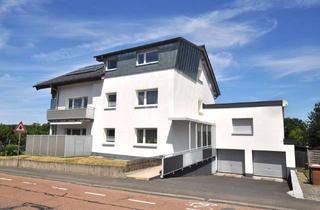 Haus kaufen in 65232 Taunusstein, Modernisiertes MFH mit 4 Wohnungen - ideal für Kapitalanleger oder Eigennutzer mit Platzbedarf