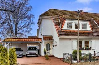 Doppelhaushälfte kaufen in 22844 Norderstedt, Charmante Doppelhaushälfte mit gepflegtem Garten in ruhiger Lage