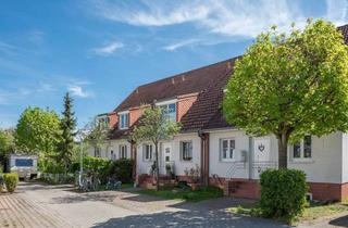 Haus kaufen in 14624 Dallgow-Döberitz, Vermietetes Reihenendhaus mit Garten und idyllischem Ausblick - Provisionsfrei
