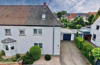 Haus kaufen in 48527 Nordhorn, Charmantes Reihenendhaus mit Potenzial in Nordhorn – Blumensiedlung