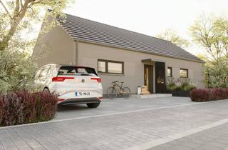 Haus kaufen in 32289 Rödinghausen, Moderner Bungalow mit überdachter Terrasse.