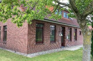 Einfamilienhaus kaufen in 26340 Zetel, Zetel - Einfamilienhaus mit Einliegerwohnung und Garagen