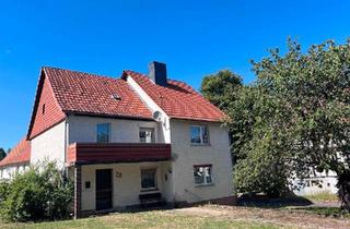 Haus kaufen in 37284 Waldkappel, Waldkappel - 2 Familienhaus mit zus. Ausbaupotenzial in Waldkappel-Hasselbach