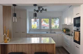 Wohnung kaufen in 71272 Renningen, Renningen - Charmante 4-Zimmer-Erdgeschosswohnung mit großem Garten in Rennin