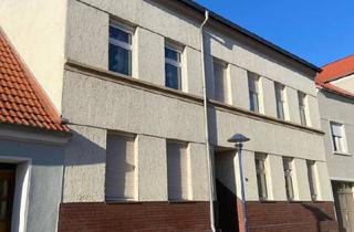Mehrfamilienhaus kaufen in 06862 Dessau-Roßlau, Dessau-Roßlau - Mietshaus mit 3-4 Wohneinheiten und Ausbaureserve an der Elbe