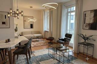 Wohnung kaufen in 76530 Innenstadt, Stilvoll wohnen im Herzen Baden-Badens – Altbauwohnung mit Balkon und Aufzug.