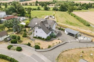 Haus kaufen in 63695 Glauburg, Hochwertiges Zweifamilienhaus zur flexiblen Nutzung – perfekt für Familien!