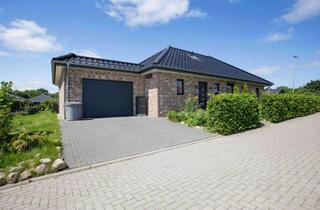 Haus kaufen in 24392 Süderbrarup, Winkelbungalow mit hochwertiger Ausstattung und moderner Haustechnik