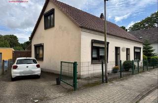 Haus kaufen in 27749 Schafkoven/Donneresch, Charmante Immobilie mit 2 Wohneinheiten, viel Nutzfläche und großem Garten