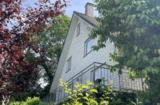 Einfamilienhaus kaufen in 33790 Halle, Seltene Gelegenheit: Freistehendes Einfamilienhaus mit Einliegerwohnung in exklusiver Wohnlage