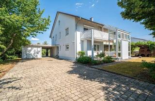 Einfamilienhaus kaufen in 88437 Maselheim, Beeindruckendes Wohnambiente! Großzügiges Einfamilienhaus mit Wintergarten, Galerie & Garten