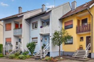 Haus kaufen in 76646 Bruchsal, Gemütliches Reihenmittelhaus mit großer Terrasse und Garage in Bruchsal