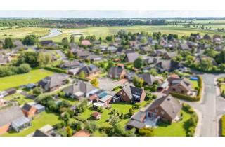 Einfamilienhaus kaufen in 26759 Hinte, Großzügiges Einfamilienhaus mit idyllischem Garten, Garage und Kamin in ruhiger Lage