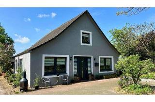 Einfamilienhaus kaufen in Tettenser Steg, 26954 Nordenham, Charmantes Einfamilienhaus mit liebevoll angelegtem Garten in Nordenham-Tettens