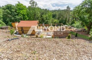 Grundstück zu kaufen in 73663 Berglen, Großzügiges Grundstück mit genehmigtem Bauvorhaben und modernem Holzhaus in ruhiger Lage