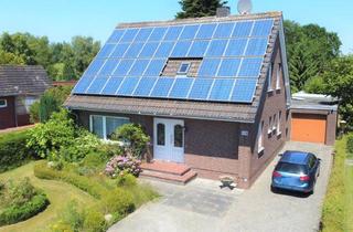 Einfamilienhaus kaufen in 26871 Papenburg, gepflegtes Einfamilienhaus mit PV-Anlagein Kanallage auf großem Grundstück