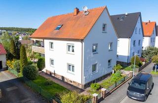 Haus kaufen in 35625 Hüttenberg, Charmantes Wohnhaus mit Einliegerwohnung auf sonnigem Grundstück in Hüttenberg-Rechtenbach