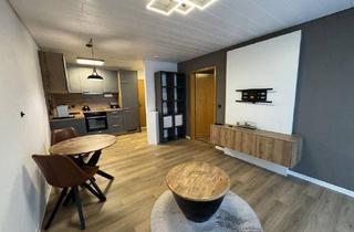 Wohnung kaufen in 71554 Weissach, Weissach im Tal - Moderne 1.5 Zimmer-Wohnung mit Balkon und privaten Stellplatz
