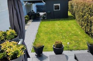 Wohnung kaufen in 59558 Lippstadt, Lippstadt - Gemütliche Eigentumswohnung mit schönem Gartenanteil