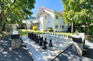 Haus kaufen in 55234 Erbes-Büdesheim, Doppeltes Wohnglück: Modernes Zweifamilienhaus mit vielfältigen Nutzungsoptionen