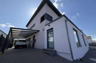 Haus kaufen in Neukirchner Straße 25, 65510 Hünstetten, Exklusives Designhaus mit Pool und innovativem Energiekonzept – Wohnen auf höchstem Niveau