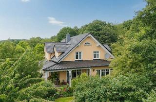 Villa kaufen in 35096 Weimar, Landhausvilla - ganz für sichmit Veranda und parkähnlicher Gartenanlage!