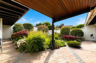 Haus kaufen in 61350 Bad Homburg, Bungalow mit charmantem Innenhofcharakter!