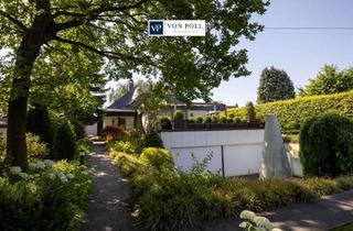 Haus kaufen in 41363 Jüchen, Modernisiertes Refugium: Großzügiges Wohnen mit Park und Pool