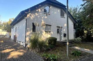Einfamilienhaus kaufen in Kuckumer Dorfstraße 8a, 41812 Erkelenz, freistehendes Einfamilienhaus mit Wintergarten, Garage und Anbau