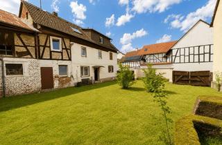 Einfamilienhaus kaufen in 35510 Butzbach, Charmantes Einfamilienhaus mit Scheune und großem Hof in zentraler Lage von Butzbach
