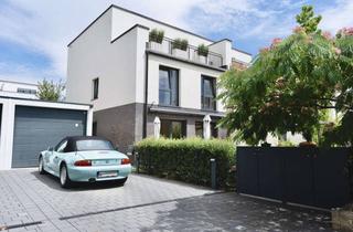 Haus kaufen in 65205 Nordenstadt, Modernes Familienhaus mit Dachterrasse, Sauna und Südwestgarten in Wiesbaden-Nordenstadt