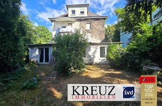 Villa kaufen in 65428 Rüsselsheim, Mehrfamilienhausvilla in zentraler Stadtlage