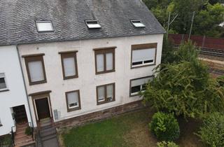 Mehrfamilienhaus kaufen in 54293 Ehrang, Mehrfamilienhaus mit 5 Wohnungen und tollem Garten