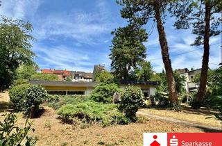 Haus kaufen in 66540 Neunkirchen, Bungalow mit großem Grundstück und zwei Garagen in zentraler Wohnlage