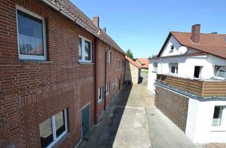 Anlageobjekt in Hakenroder Straße, 31020 Salzhemmendorf, Zwei- und Dreifamilienhaus mit Gewerbeeinheit und Doppelgarage sowie Nebengebäude in 31020 Wallensen