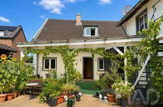 Haus kaufen in 41515 Grevenbroich, Seltene Gelegenheit in Grevenbroich: Zweifamilienhaus mit Hof, Scheune und Garten