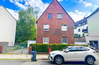 Mehrfamilienhaus kaufen in 40468 Unterrath, Attraktives Mehrfamilienhaus mit drei Wohneinheiten, großem Garten und zwei Garagen in Düsseldorf