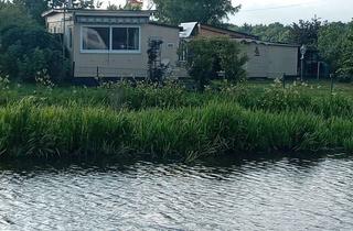 Haus kaufen in 27711 Osterholz-Scharmbeck, Ferienhaus am Wasser