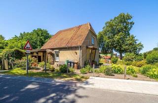 Haus kaufen in 24640 Hasenmoor, ***Handwerker aufgepasst - Gepflegtes Siedlungshaus auf großzügigem Grundstück***