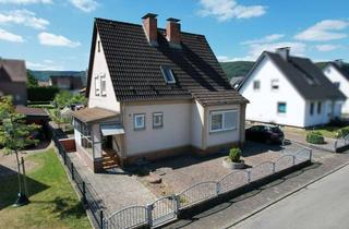 Einfamilienhaus kaufen in 37697 Lauenförde, Gepflegtes Einfamilienhaus mit Garage und Anbau in Lauenförde