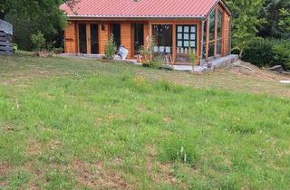 Haus kaufen in 37299 Weißenborn, Weißenborn - Winterfester Bungalow mit Garage und Solar