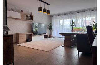 Wohnung kaufen in 34225 Baunatal, Baunatal - Eigentumswohnung mit 100,29 m², zwei Balkonen, Garage und exklusi