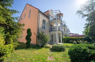 Wohnung kaufen in 85757 Karlsfeld, Wohnen mit Gartenflair 3-Zimmer-Erdgeschosswohnung mit großem Hobbyraum