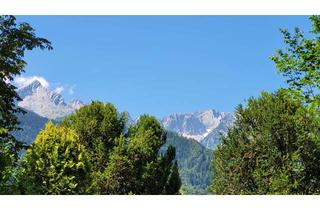 Wohnung kaufen in 82467 Garmisch-Partenkirchen, Großzügige, freundliche 2-Zi.-Terrassen-Whg. mit viel Bergblick und Kfz-Stellplatz