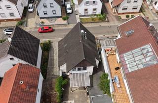 Einfamilienhaus kaufen in 76870 Kandel, Charmantes Einfamilienhaus mit großzügigem Grundstück und Entwicklungspotenzial in begehrter Wohnlag